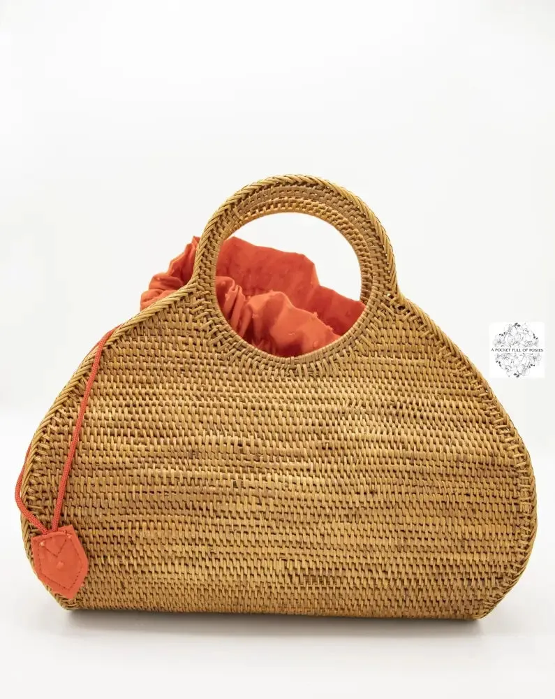 Ata Pear-shaped O handle bag with red drawstring lining