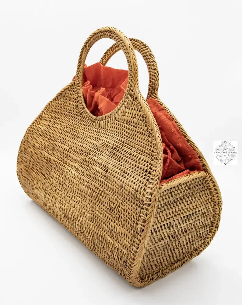 Ata Pear-shaped O handle bag with red drawstring lining