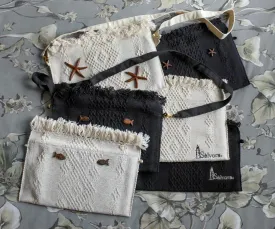 Handcrafted backstrap loom bags with zip closure. Handicraft clutch bag from mexican artisan weaver and Sonora iron wood carving