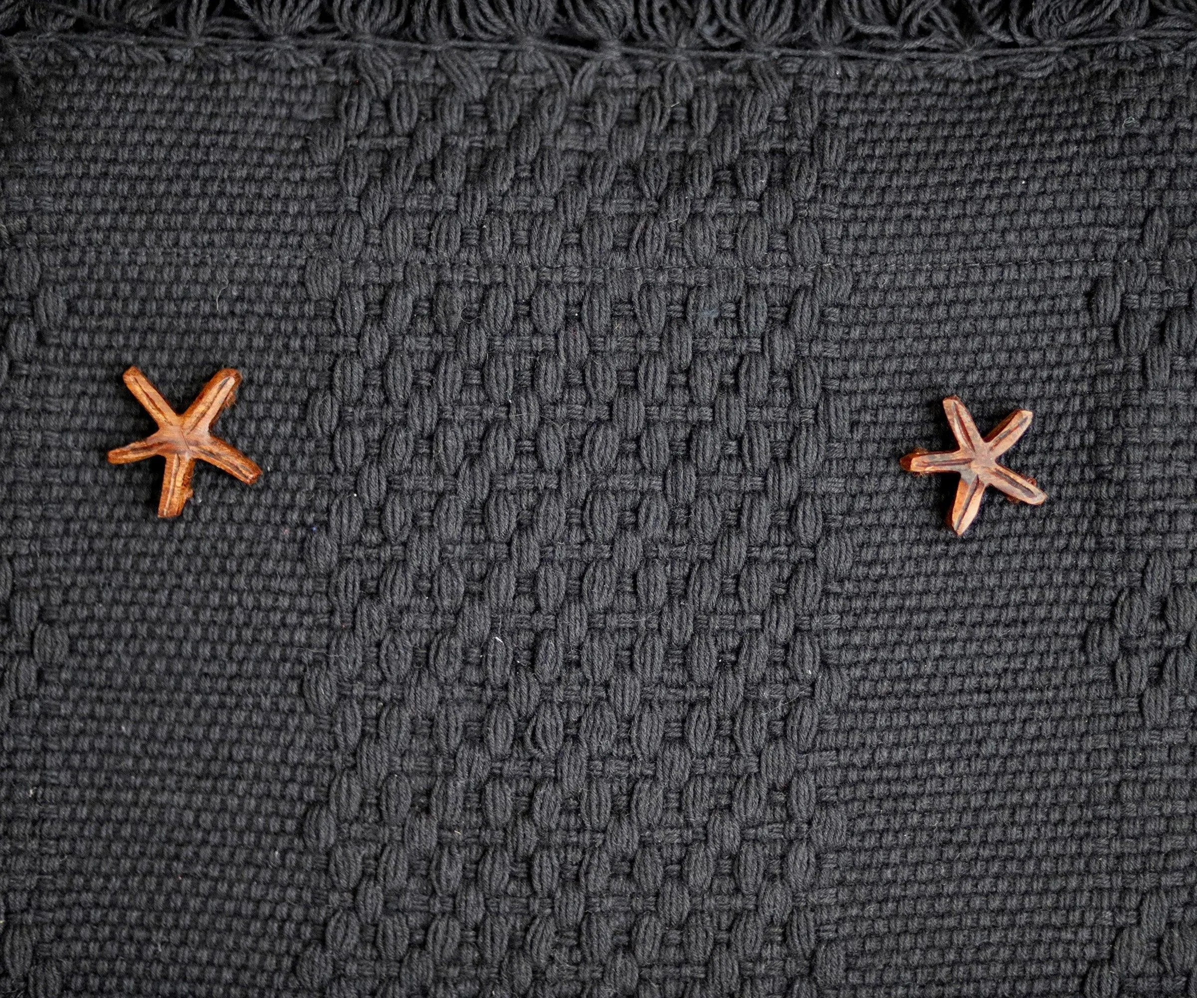 Handcrafted backstrap loom bags with zip closure. Handicraft clutch bag from mexican artisan weaver and Sonora iron wood carving