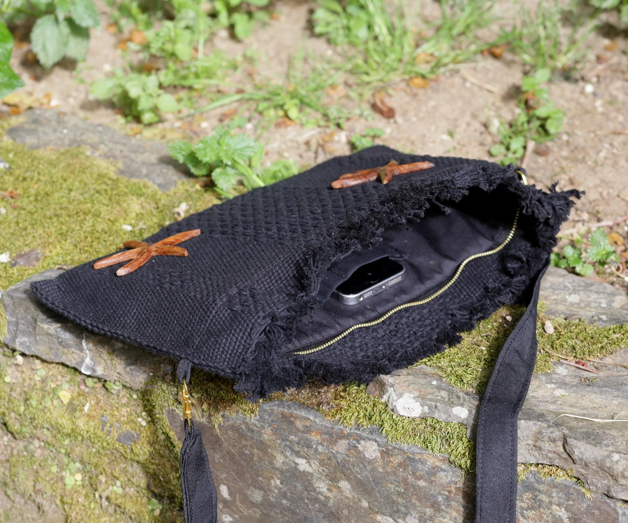 Handcrafted backstrap loom bags with zip closure. Handicraft clutch bag from mexican artisan weaver and Sonora iron wood carving