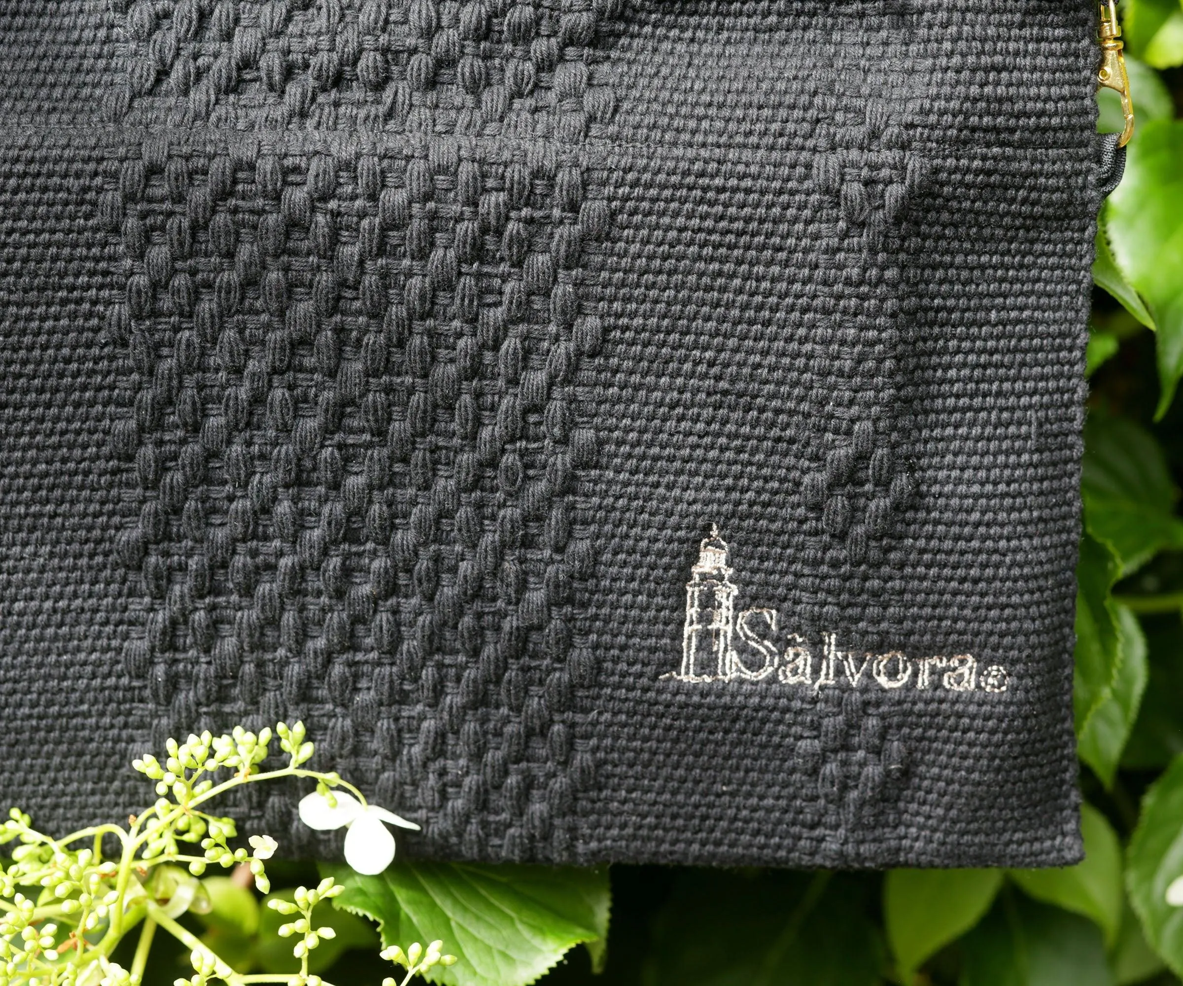 Handcrafted backstrap loom bags with zip closure. Handicraft clutch bag from mexican artisan weaver and Sonora iron wood carving